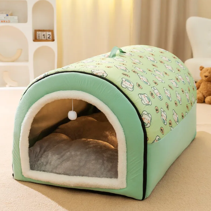 Green pet bed with cartoon pattern on a beige surface