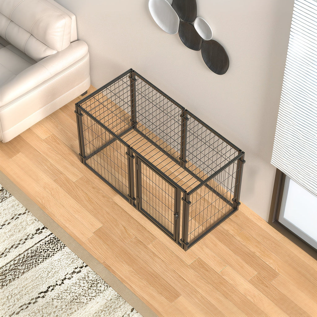 Black metal pet crate on a wooden floor in a room with a couch and window blinds.