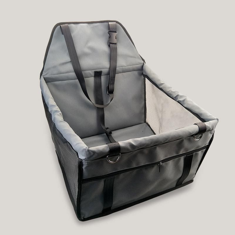 Gray pet seat cover with straps on a light gray background
