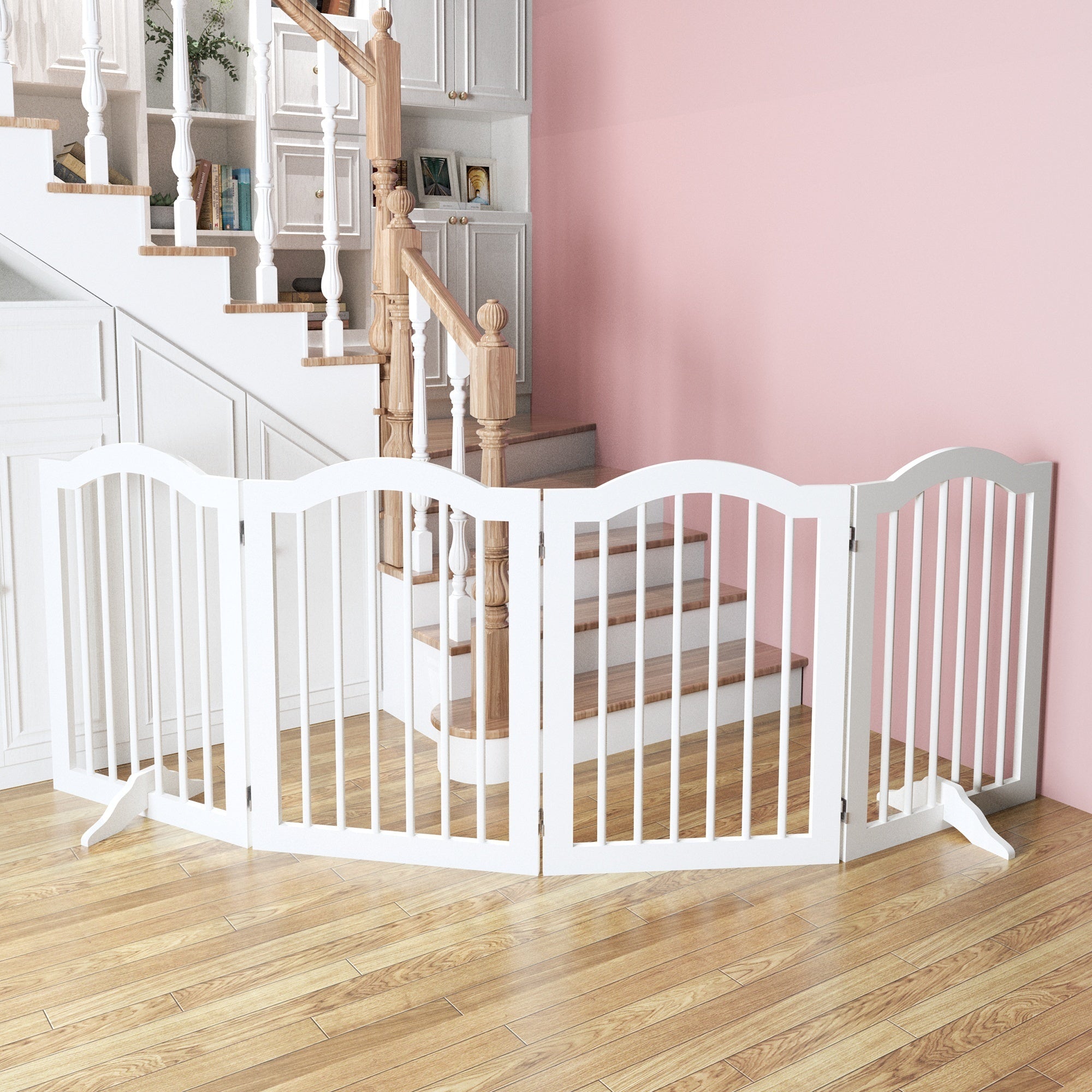 White pet gate in a home setting with a staircase and pink wall.