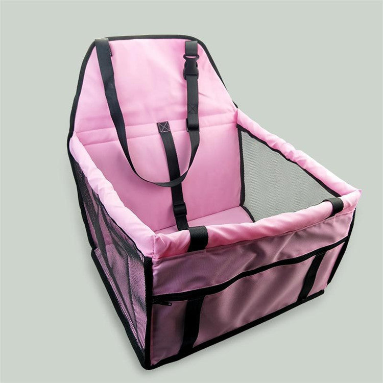 Pink and black pet seat on a gray background