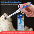 Pet medicine feeder being used on a cat with packaging in the foreground