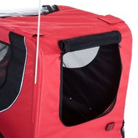 Red pet carrier with black interior on a white background