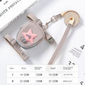 Small pouch with a pink star and strap on a magazine page