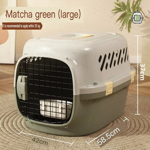 Pet carrier with dimensions labeled on a wooden floor.