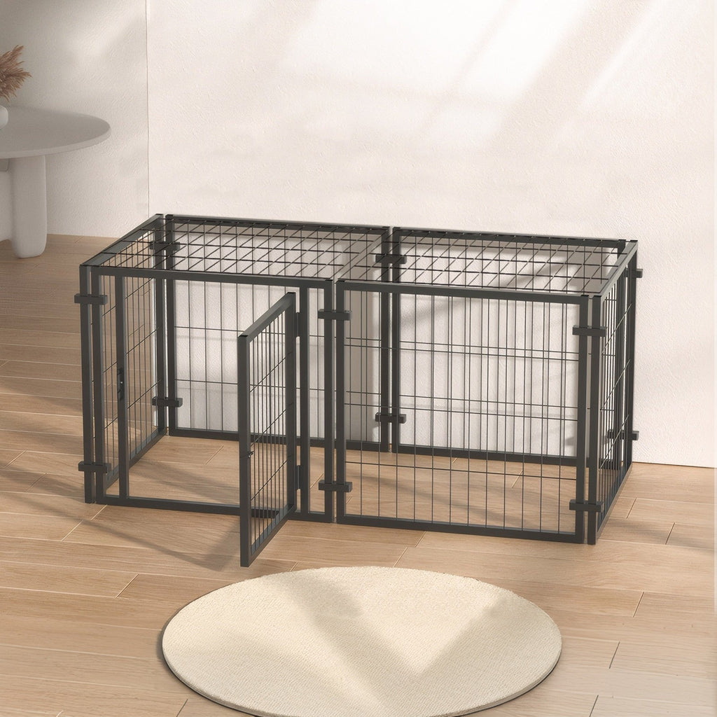 Black metal pet playpen on a wooden floor with a white wall background