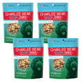 Four packages of Charlee Bear Original Crunch dog treats on a white background
