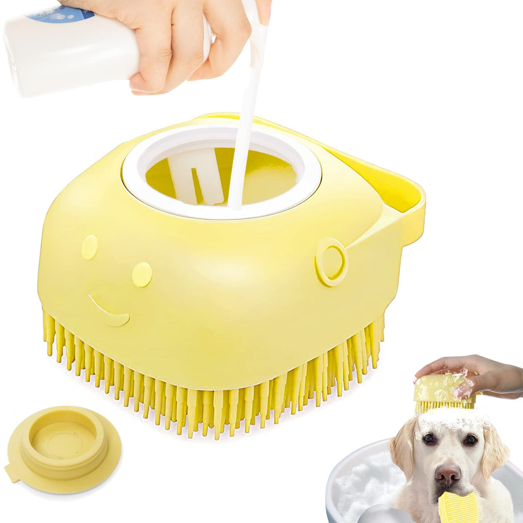 Yellow pet grooming brush with a hand applying shampoo and a dog receiving care.