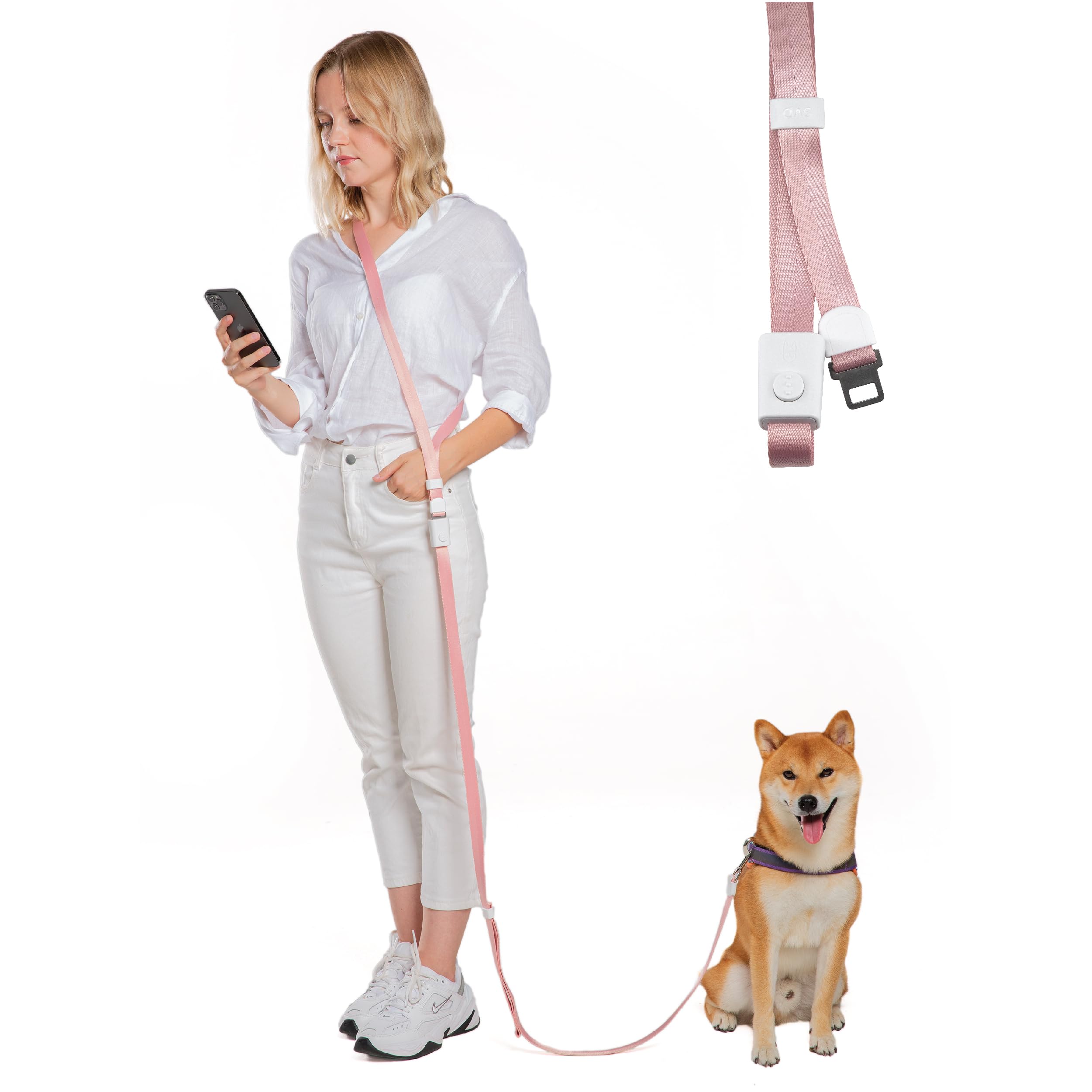 Woman holding a pink dog leash with a dog sitting next to her on a white background