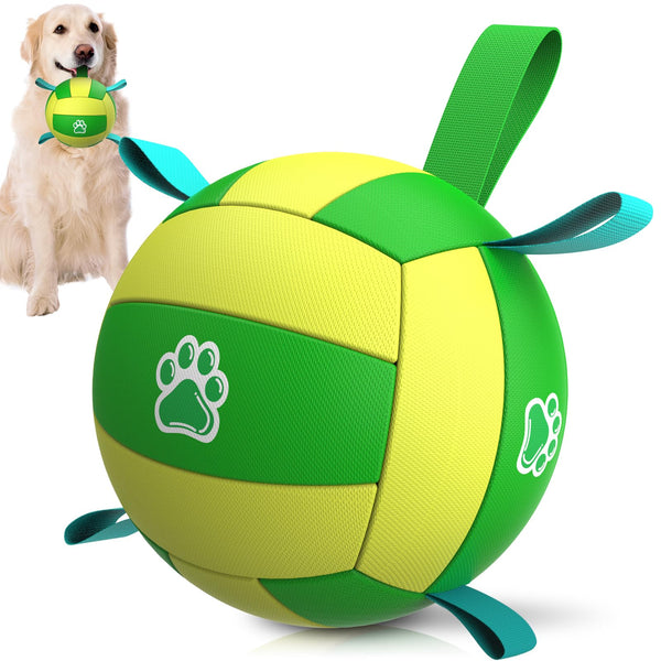 Green and yellow ball with paw print design and dog in the background