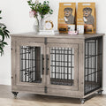 Wooden pet crate with metal bars on a wooden floor, with dog food bags and a clock in the background.