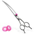 Hair cutting scissors with pink accents on a white background