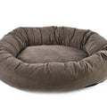 Brown donut-shaped pet bed on a white background