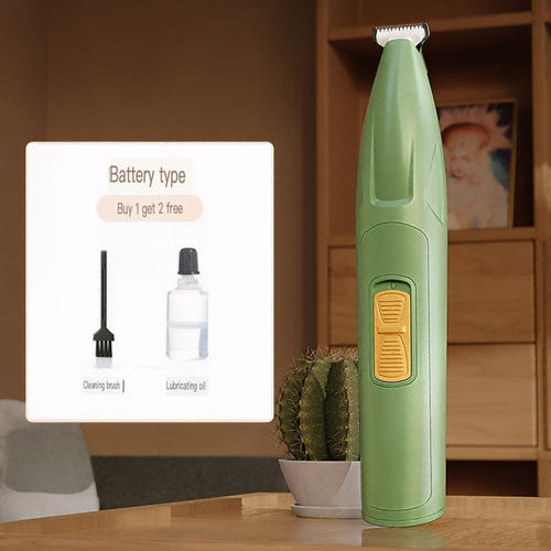 Green nail trimmer on a wooden table with a product information card in the background.