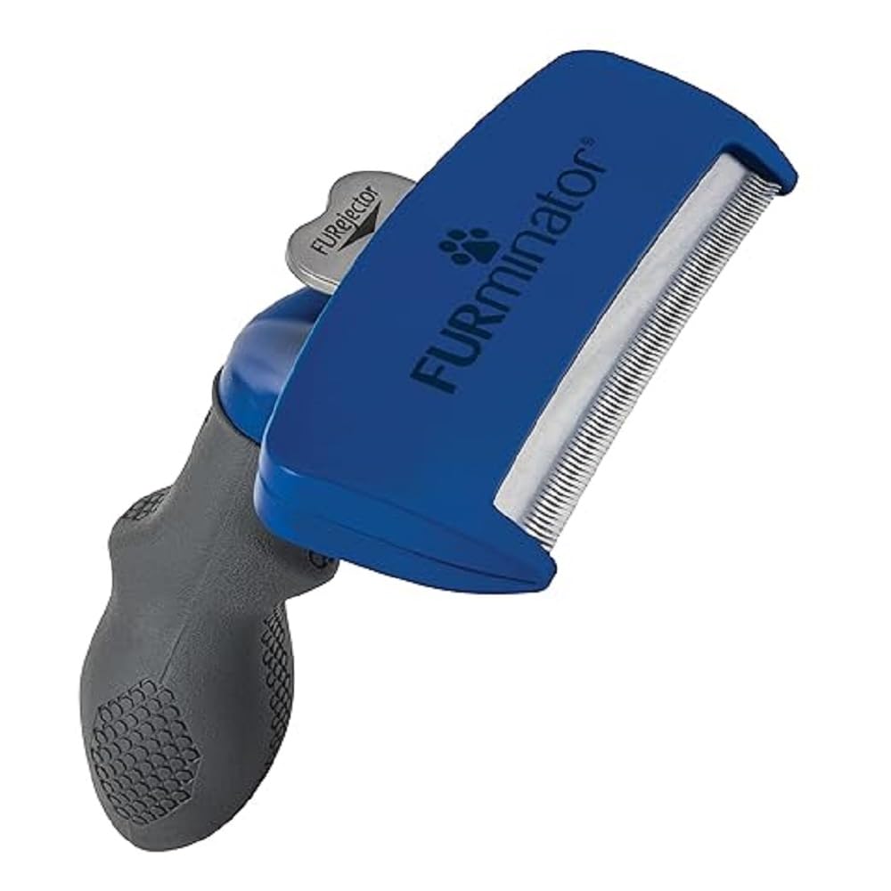 Blue and gray FURminator pet grooming tool on a white background