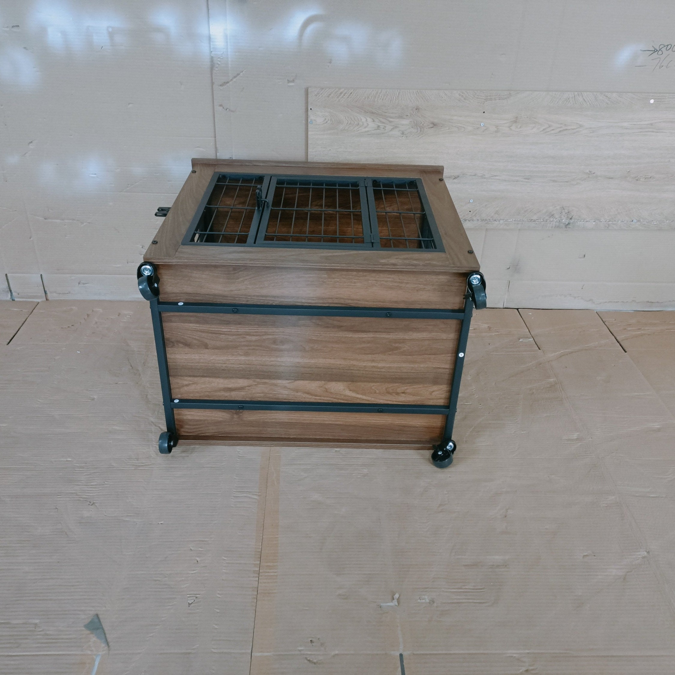 Wooden table with metal frame on a tiled floor