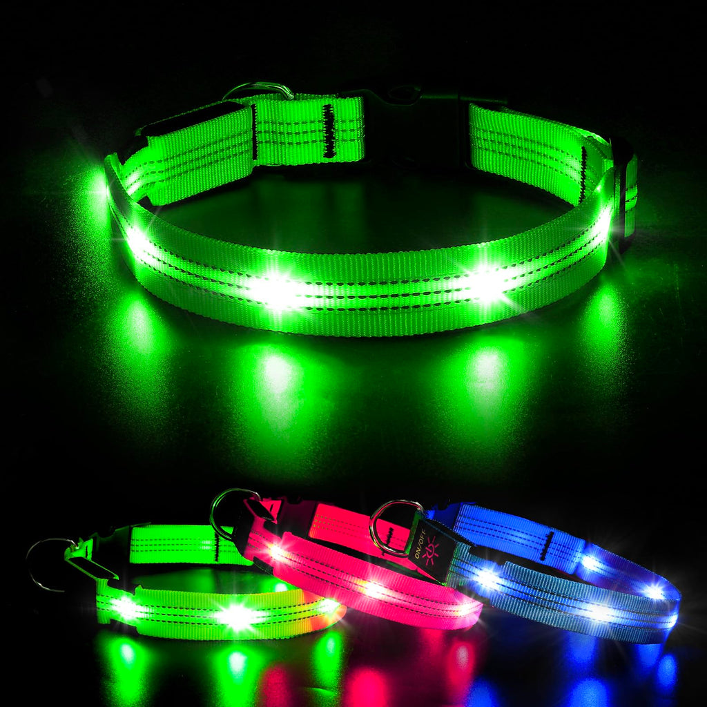 Green LED dog collar glowing on a dark background with additional collars in pink and blue below.